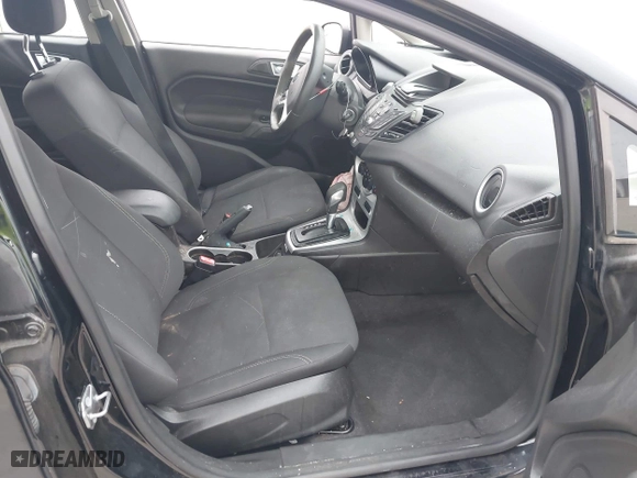 2016 Ford Fiesta SE with VIN 3FADP4EJ3GM203760, listed as a IAAI auction lot 41928386 with 52,744 mi miles. Bid and sale history available at carsss.com. Image 5.