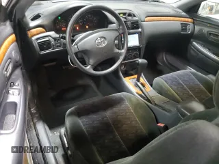 2003 Toyota Solara SE z VIN 2T1CF22P43C602511, wystawiony jako Copart lot #56197715 z przebiegiem 86 921 mil mil oraz Szkoda całkowita • Salvage title. Historia ofert i sprzedaży dostępna na DreamBid. Obrazek 8.