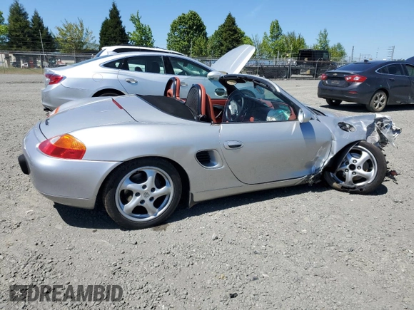 1998 Porsche Boxster z VIN WP0CA2986WU620657, wystawiony jako Copart lot #55595275 z przebiegiem 78 711 mil mil oraz Szkoda całkowita • Salvage title. Historia ofert i sprzedaży dostępna na DreamBid. Obrazek 3.