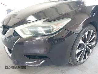 2016 Nissan Maxima SV with VIN 1N4AA6AP5GC413563, listed as a IAAI auction lot 42196144 with 209,711 mi miles and . Bid and sale history available at DreamBid. Image 6.