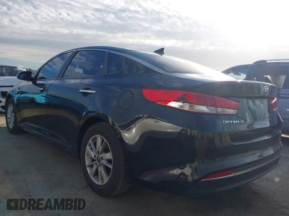 2018 Kia Optima LX with VIN KNAGT4L35J5238723, listed as a IAAI auction lot 41702109 with 66,620 mi miles. Bid and sale history available at carsss.com. Image 3.