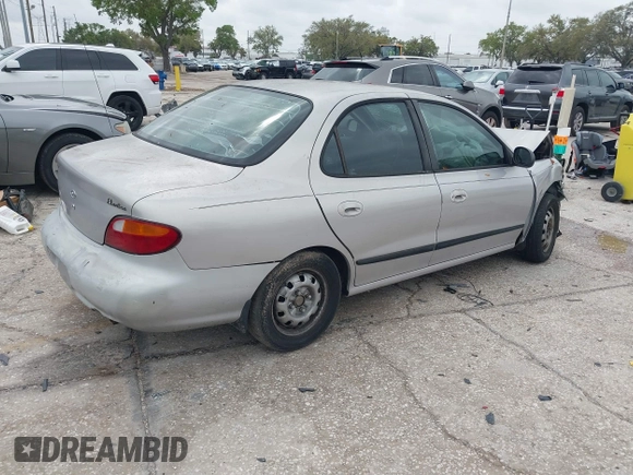 1998 Hyundai Elantra with VIN KMHJF24M7WU672436, listed as a IAAI auction lot 41763627 with 114,288 mi miles and . Bid and sale history available at DreamBid. Image 4.