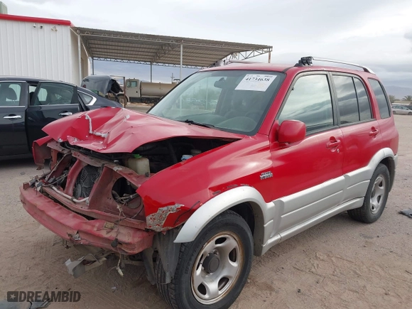 2004 Suzuki Grand Vitara with VIN JS3TE62V344100216, listed as a IAAI auction lot 41734638 with 213,166 mi miles. Bid and sale history available at carsss.com. Image 6.