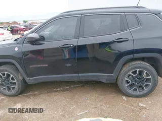 2019 Jeep Compass Trailhawk z VIN 3C4NJDDB5KT618149, wystawiony jako IAAI lot #41959320 z przebiegiem 99 795 mil mil oraz . Historia ofert i sprzedaży dostępna na DreamBid. Obrazek 14.
