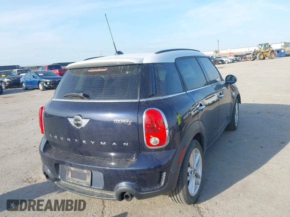 2013 MINI Countryman S ALL4 with VIN WMWZC5C58DWP33707, listed as a IAAI auction lot 41835234 with 98,441 mi miles and . Bid and sale history available at DreamBid. Image 4.