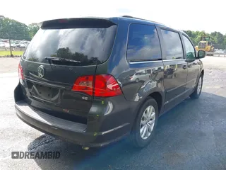 2012 Volkswagen Routan SE with VIN 2C4RVABG3CR293458, listed as a IAAI auction lot 42210411 with 139,390 mi miles and . Bid and sale history available at DreamBid. Image 4.