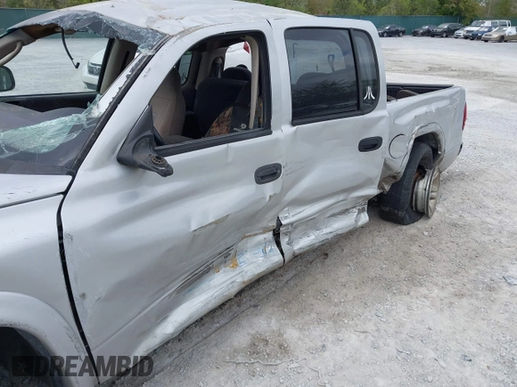 2003 Dodge Dakota SLT with VIN 1D7HL48N13S274856, listed as a IAAI auction lot 41954038 with 306,728 mi miles. Bid and sale history available at carsss.com. Image 6.