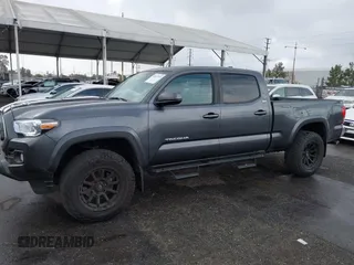 2022 Toyota Tacoma SR5 with VIN 3TMBZ5DN2NM034561, listed as a IAAI auction lot 40867443 with 51,728 mi miles and . Bid and sale history available at DreamBid. Image 14.