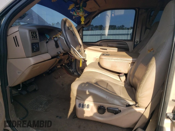 1999 Ford F-250 XL with VIN 1FTNX21F0XEE70963, listed as a Copart auction lot 52294955 with 218,969 mi miles and Salvage title. Bid and sale history available at DreamBid. Image 7.