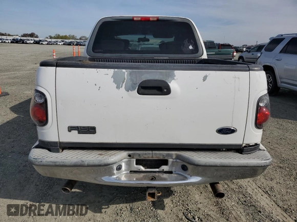 2003 Ford F-150 XLT with VIN 1FTRW07653KB64255, listed as a Copart auction lot 48341125 with 324,912 mi miles and Salvage Title. Bid and sale history available at carsss.com. Image 6.