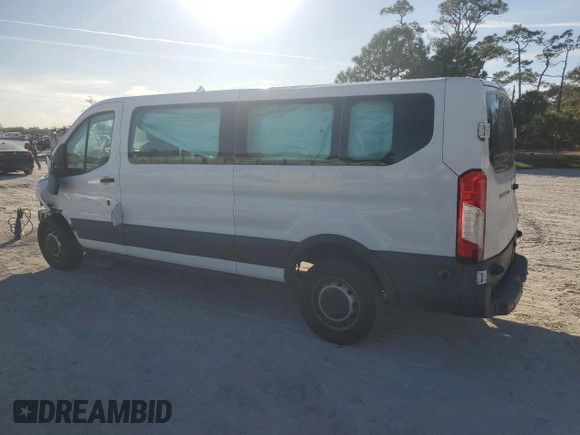 2018 Ford Transit Passenger XL с VIN 1FBZX2ZM2JKB56121, выставлен на аукционе Copart как лот 83858524 с пробегом 73 929 миль миль и Списание • Salvage title. История ставок и продаж доступна на DreamBid. Изображение 2.