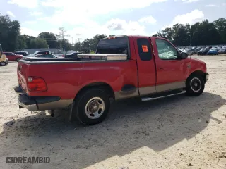 2003 Ford F-150 XL with VIN 1FTRX07WX3KD51374, listed as a Copart auction lot 71796464 with 130,319 mi miles and Salvage Title. Bid and sale history available at carsss.com. Image 3.