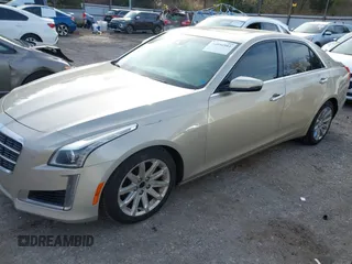 2014 Cadillac CTS Luxury RWD with VIN 1G6AR5SX5E0178417, listed as a IAAI auction lot 40956981 with 117,532 mi miles. Bid and sale history available at carsss.com. Image 14.