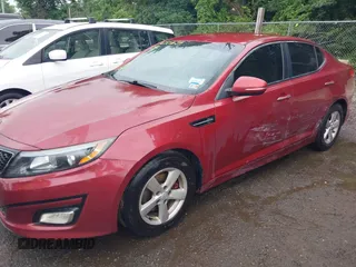 2015 Kia Optima LX with VIN 5XXGM4A7XFG455242, listed as a IAAI auction lot 42501654 with 139,209 mi miles and . Bid and sale history available at DreamBid. Image 6.