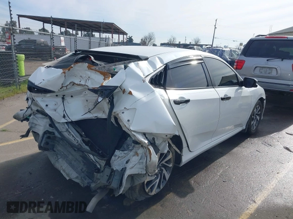 2016 Honda Civic EX with VIN 19XFC2F72GE097060, listed as a IAAI auction lot 41626940 with 156,941 mi miles and . Bid and sale history available at DreamBid. Image 4.