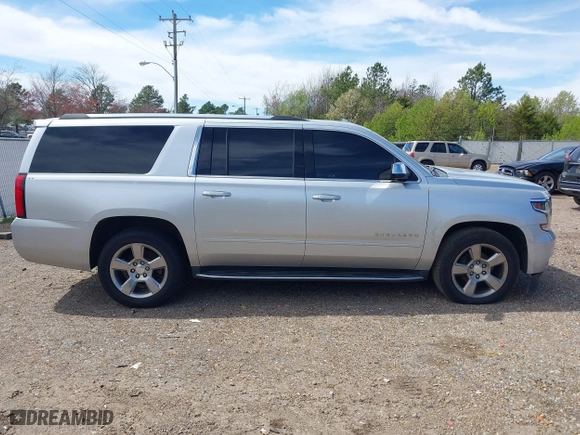 2020 Chevrolet Suburban Premier with VIN 1GNSCJKCXLR219679, listed as a IAAI auction lot 41806579 with 90,132 mi miles. Bid and sale history available at carsss.com. Image 13.