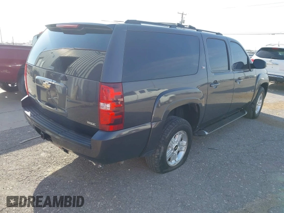 2011 Chevrolet Suburban LT with VIN 1GNSKJE34BR242629, listed as a IAAI auction lot 42043276 with 197,722 mi miles and . Bid and sale history available at DreamBid. Image 4.