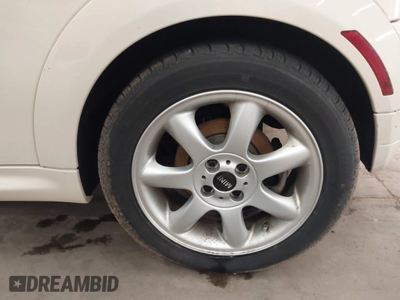 2010 MINI Hardtop S with VIN WMWMF7C50ATZ71884, listed as a IAAI auction lot 41731490 with 55,864 mi miles and . Bid and sale history available at DreamBid. Image 12.