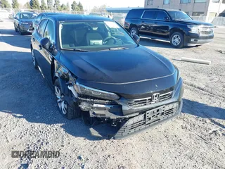 2022 Honda Civic LX z VIN 2HGFE2F29NH580563, wystawiony jako IAAI lot #41861920 z przebiegiem 15 559 mil mil oraz . Historia ofert i sprzedaży dostępna na DreamBid. Obrazek 6.