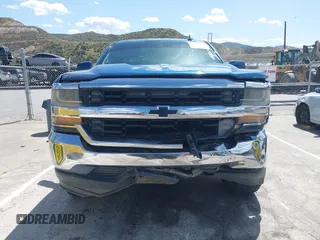 2016 Chevrolet Silverado 1500 LT with VIN 1GCRCRECXGZ116592, listed as a IAAI auction lot 41947339 with 167,241 mi miles and . Bid and sale history available at DreamBid. Image 12.