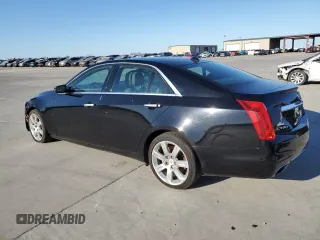 2014 Cadillac CTS Premium AWD with VIN 1G6AZ5S31E0130572, listed as a Copart auction lot 50060845 with 72,335 mi miles and Salvage Title. Bid and sale history available at DreamBid. Image 2.