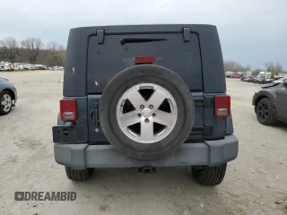 2007 Jeep Wrangler Unlimited Sahara z VIN 1J4GB59147L165439, wystawiony jako Copart lot #50794065 z przebiegiem 255 385 mil mil oraz Szkoda całkowita • Salvage title. Historia ofert i sprzedaży dostępna na DreamBid. Obrazek 6.