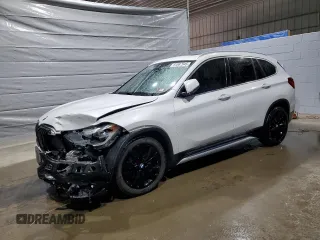 2020 BMW X1 xDrive28i z VIN WBXJG9C0XL5P58342, wystawiony jako Copart lot #51087945 z przebiegiem 34 936 mil mil oraz Szkoda całkowita • Salvage title. Historia ofert i sprzedaży dostępna na DreamBid. Obrazek 1.
