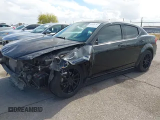 2014 Dodge Avenger SE z VIN 1C3CDZAGXEN130092, wystawiony jako IAAI lot #42216767 z przebiegiem 131 177 mil mil oraz . Historia ofert i sprzedaży dostępna na DreamBid. Obrazek 2.