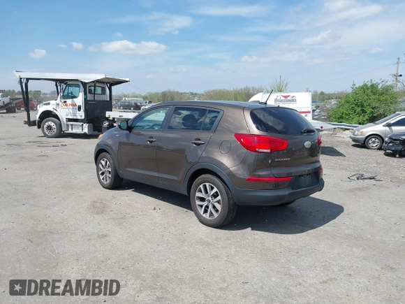 2014 Kia Sportage LX with VIN KNDPBCAC4E7629701, listed as a IAAI auction lot 42097140 with 183,552 mi miles and . Bid and sale history available at carsss.com. Image 3.