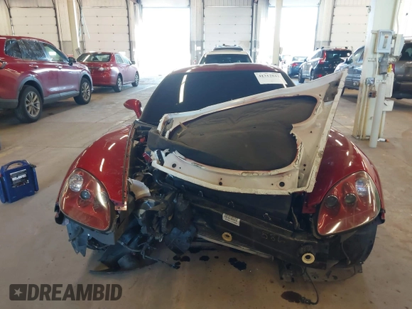 2005 Chevrolet Corvette with VIN 1G1YY24U755114259, listed as a IAAI auction lot 41312843 with 57,254 mi miles. Bid and sale history available at carsss.com. Image 13.