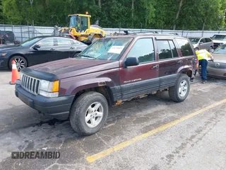 1997 Jeep Grand Cherokee Laredo with VIN 1J4GZ58S0VC708420, listed as a IAAI auction lot 42624603 with Not provided miles and . Bid and sale history available at DreamBid. Image 2.