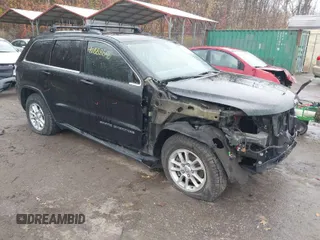 2019 Jeep Grand Cherokee Laredo E with VIN 1C4RJFAG1KC719732, listed as a IAAI auction lot 40888646 with 121,177 mi miles. Bid and sale history available at carsss.com. Image 1.