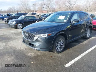 2024 Mazda CX-5 2.5 S Premium Package with VIN JM3KFBDM3R0400333, listed as a IAAI auction lot 41741454 with 14,116 mi miles. Bid and sale history available at carsss.com. Image 17.
