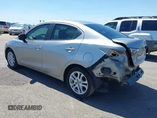 2016 Scion iA z VIN 3MYDLBZV1GY132561, wystawiony jako IAAI lot #42425947 z przebiegiem 94 882 mil mil oraz . Historia ofert i sprzedaży dostępna na DreamBid. Obrazek 3.
