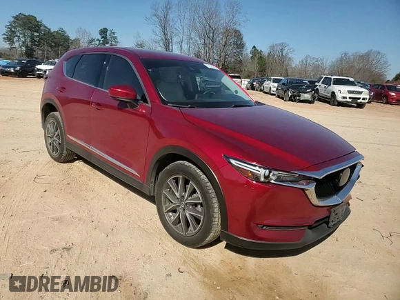 2018 Mazda CX-5 Grand Touring with VIN JM3KFADM5J0350937, listed as a Copart auction lot 46525965 with 59,478 mi miles and Salvage Title. Bid and sale history available at DreamBid. Image 12.
