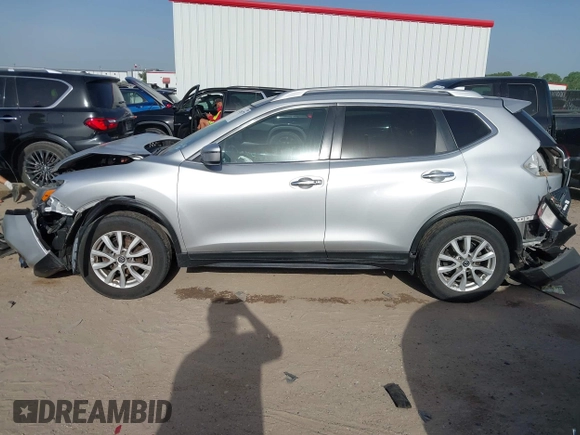 2019 Nissan Rogue SV with VIN KNMAT2MT0KP527901, listed as a IAAI auction lot 42260779 with 102,975 mi miles and . Bid and sale history available at DreamBid. Image 14.