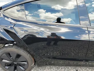 2025 Tesla Model 3 Long Range with VIN 5YJ3E1EA8SF984931, listed as a Copart auction lot 61259345 with 2,248 mi miles and Salvage title. Bid and sale history available at DreamBid. Image 10.