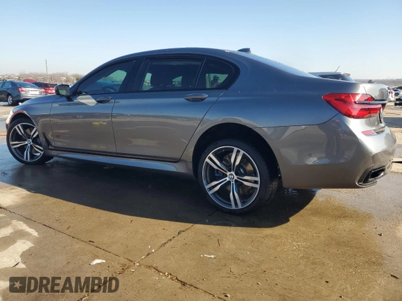 2019 BMW 7 Series 750i with VIN WBA7F0C59KGM25051, listed as a Copart auction lot 87285534 with Not Provided miles and Salvage Title. Bid and sale history available at DreamBid. Image 2.