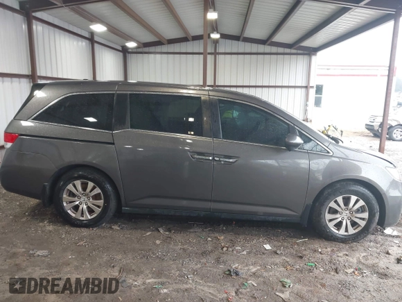 2014 Honda Odyssey EX-L with VIN 5FNRL5H6XEB060090, listed as a IAAI auction lot 41625571 with 112,762 mi miles and . Bid and sale history available at carsss.com. Image 13.