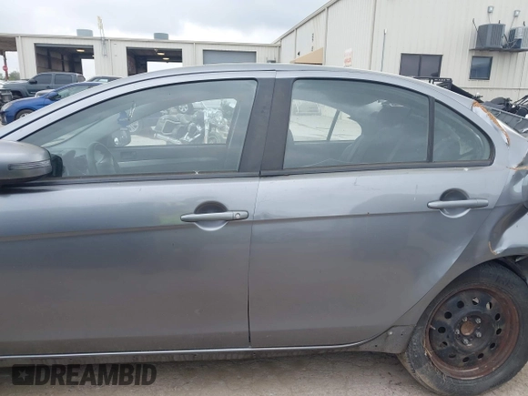 2015 Mitsubishi Lancer ES with VIN JA32U2FU4FU020089, listed as a IAAI auction lot 42036021 with 190,673 mi miles. Bid and sale history available at carsss.com. Image 14.