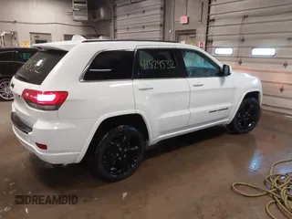2015 Jeep Grand Cherokee Laredo with VIN 1C4RJFAG4FC660665, listed as a IAAI auction lot 41529532 with 124,099 mi miles. Bid and sale history available at carsss.com. Image 4.