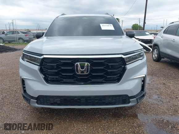 2024 Honda Pilot Touring z VIN 5FNYG1H71RB005034, wystawiony jako IAAI lot #42371878 z przebiegiem Nie podano mil oraz . Historia ofert i sprzedaży dostępna na DreamBid. Obrazek 11.