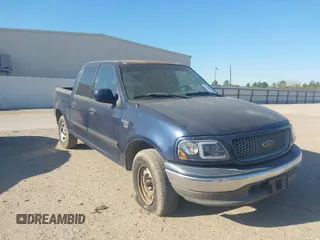 2003 Ford F-150 XLT with VIN 1FTRW07673KC94022, listed as a IAAI auction lot 41789268 with 271,047 mi miles. Bid and sale history available at carsss.com. Image 1.