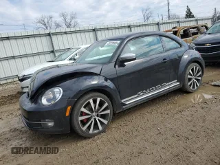 2012 Volkswagen Beetle 2.0T Turbo w/Sun/Snd/Nav PZEV with VIN 3VWVA7AT8CM605581, listed as a Copart auction lot 50728905 with 85,348 mi miles and Clean Title. Bid and sale history available at carsss.com. Image 1.