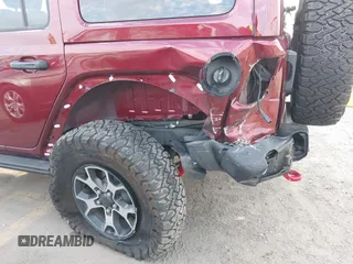 2021 Jeep Wrangler Unlimited Rubicon z VIN 1C4HJXFG0MW575473, wystawiony jako IAAI lot #41681352 z przebiegiem 54 968 mil mil oraz . Historia ofert i sprzedaży dostępna na DreamBid. Obrazek 6.