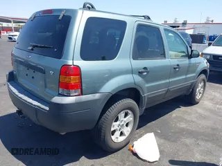2005 Ford Escape XLT with VIN 1FMYU93175KC21568, listed as a IAAI auction lot 42581547 with 134,721 mi miles and . Bid and sale history available at DreamBid. Image 4.