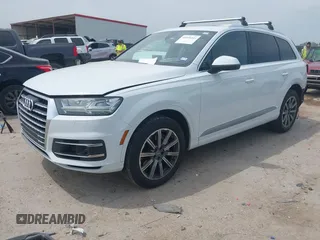2017 Audi Q7 Premium Plus z VIN WA1LAAF77HD031992, wystawiony jako IAAI lot #42058343 z przebiegiem 99 827 mil mil oraz . Historia ofert i sprzedaży dostępna na DreamBid. Obrazek 2.