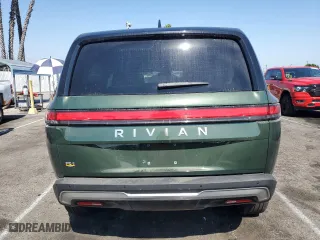 2023 Rivian R1S Adventure with VIN 7PDSGABAXPN005180, listed as a Copart auction lot 66652024 with 0 mi miles and Salvage Title. Bid and sale history available at carsss.com. Image 6.