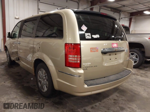 2010 Chrysler Town & Country Limited with VIN 2A4RR7DX5AR386462, listed as a IAAI auction lot 41781713 with 183,091 mi miles and . Bid and sale history available at carsss.com. Image 3.