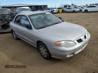 1999 Hyundai Elantra z VIN KMHJF25F8XU852123, wystawiony jako Copart lot #72284584 z przebiegiem 12 750 mil mil oraz Czysty tytuł • Clean title. Historia ofert i sprzedaży dostępna na DreamBid. Obrazek 4.